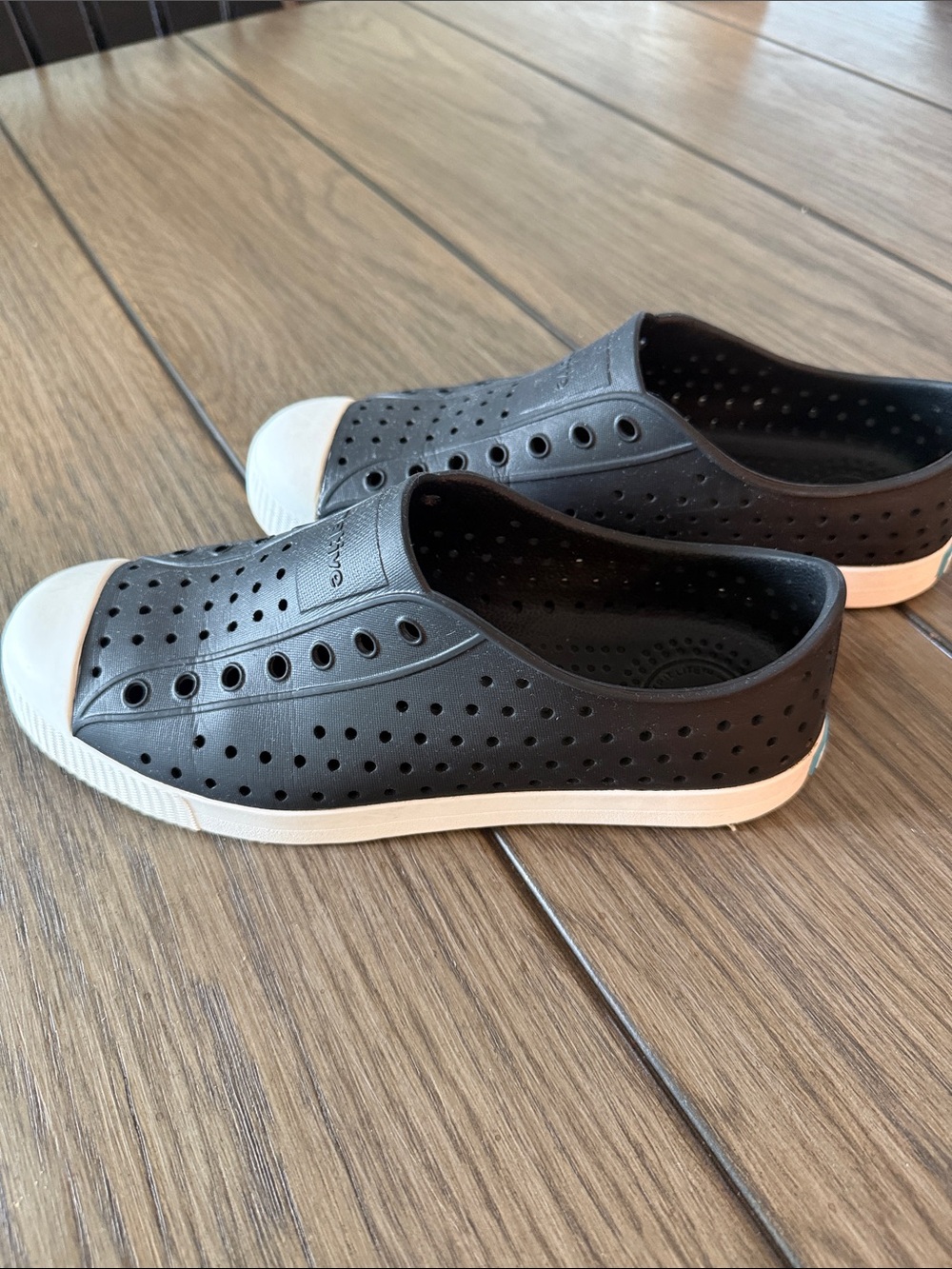 Native Black Slip-On Sneakers with White Toe and Sole